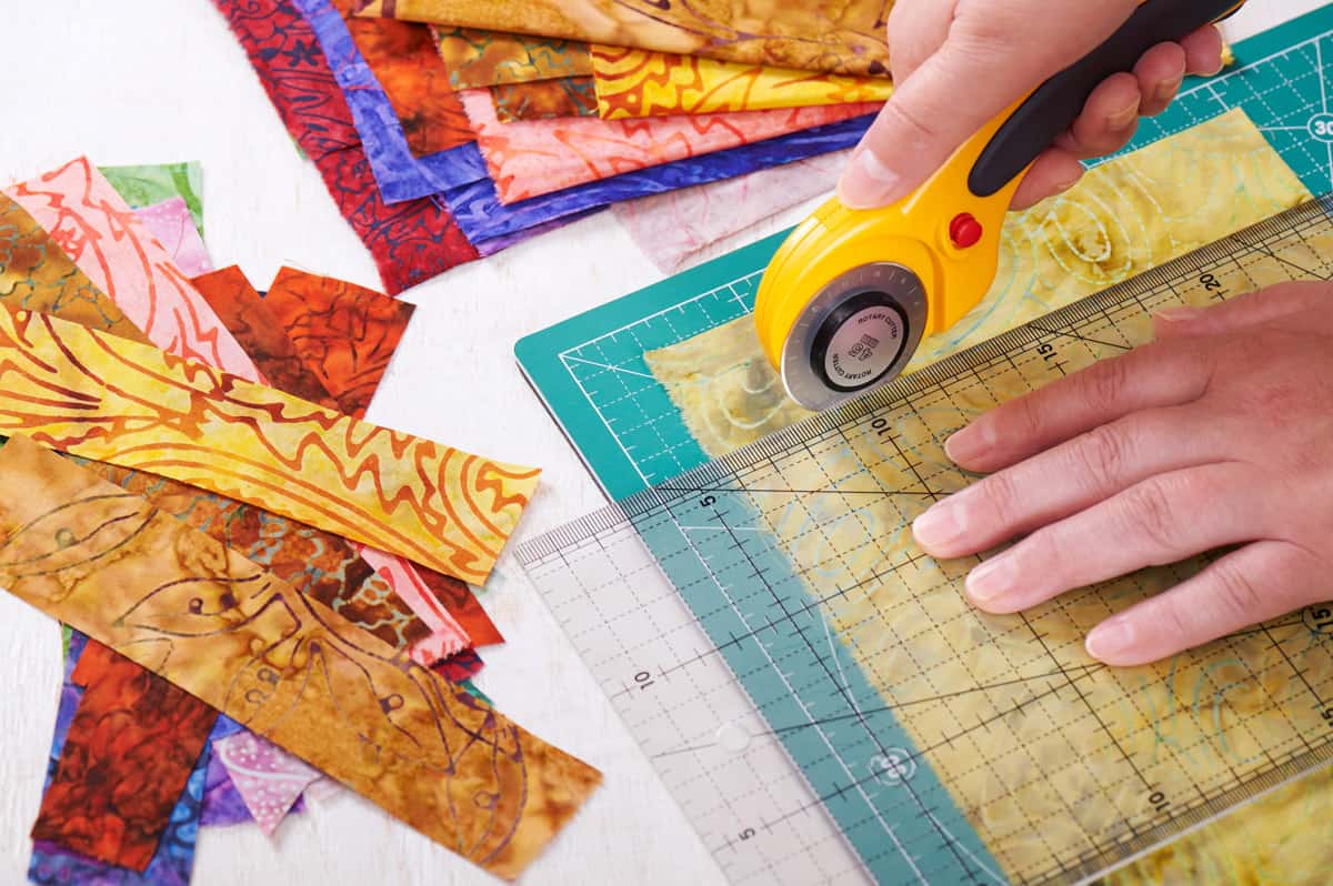 Preparing To Cut Quilt Squares With A Rotary Cutter